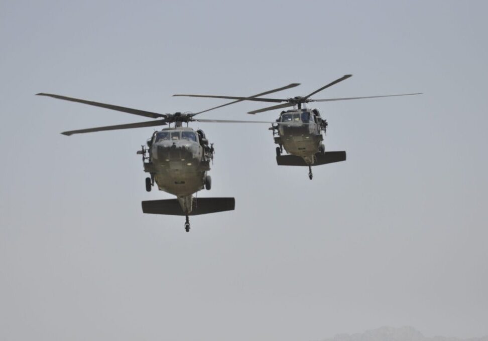 black hawk helicopter in formation